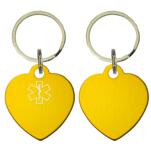 Two Gold Heart Shaped Key Chains With Medical Alert Symbol