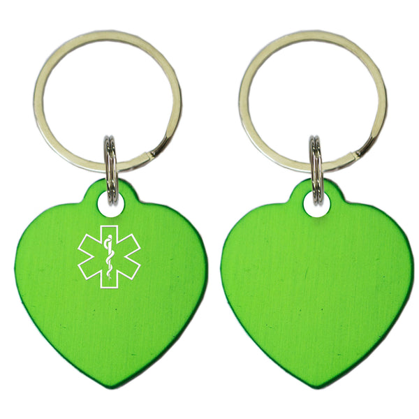 Two Green Heart Shaped Key Chains With Medical Alert Symbol